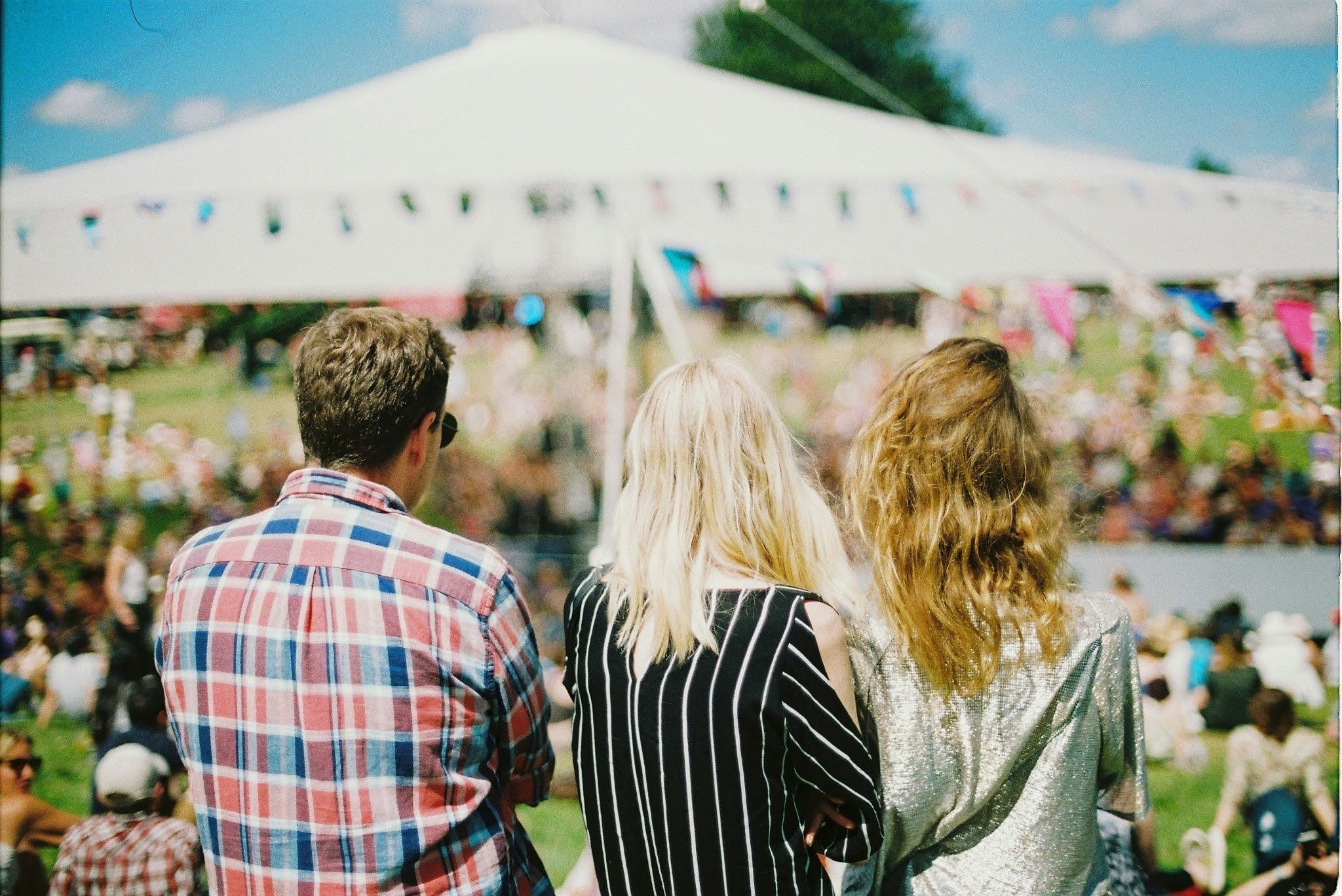 People Overlooking a Festival
