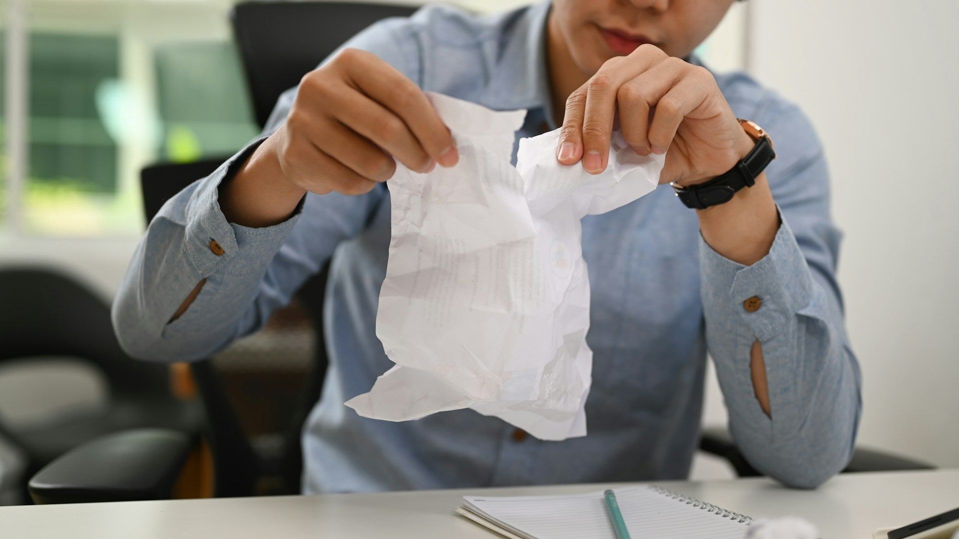 tearing paper